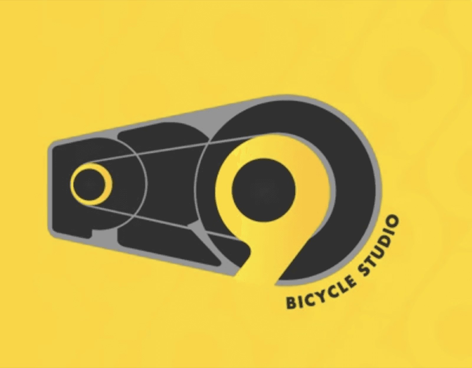 Pro9 Bicycle Studio logo — the numeral nine drawn as a chainring